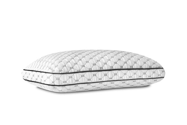 Side view of thick, memory foam pillow. Unique fabric design of diamonds and rectangles. (No Script)